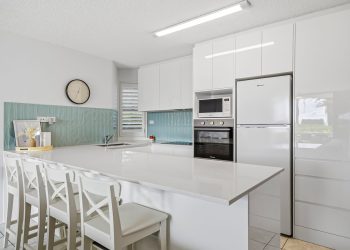 Kitchen stools and bench at Alexandria Apartments Unit 5 which is a 2 bedroom with Ocean View