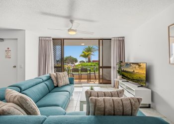 Lounge room facing the balcony at Alexandria Apartments Unit 5 which is a 2 bedroom with Ocean View